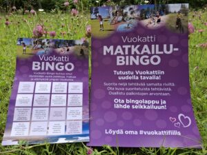 Valokuva Vuokatti bingolapusta sekä julisteesta